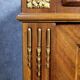 Important showcase library in fine wood and marquetry, stamped.