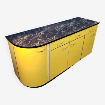 Vintage yellow sideboard, and black marble top.