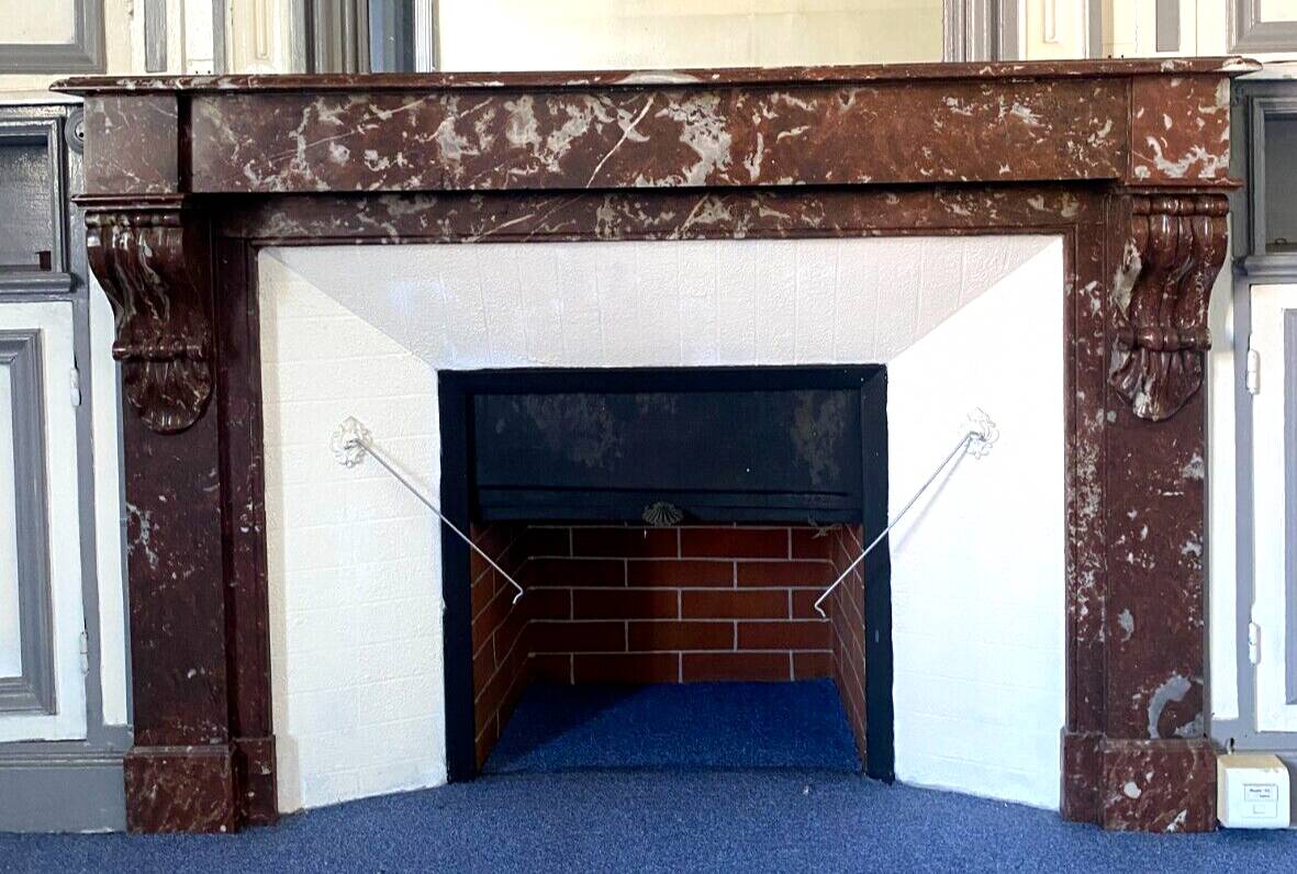 Louis Philippe style fireplace in speckled red marble 20th century