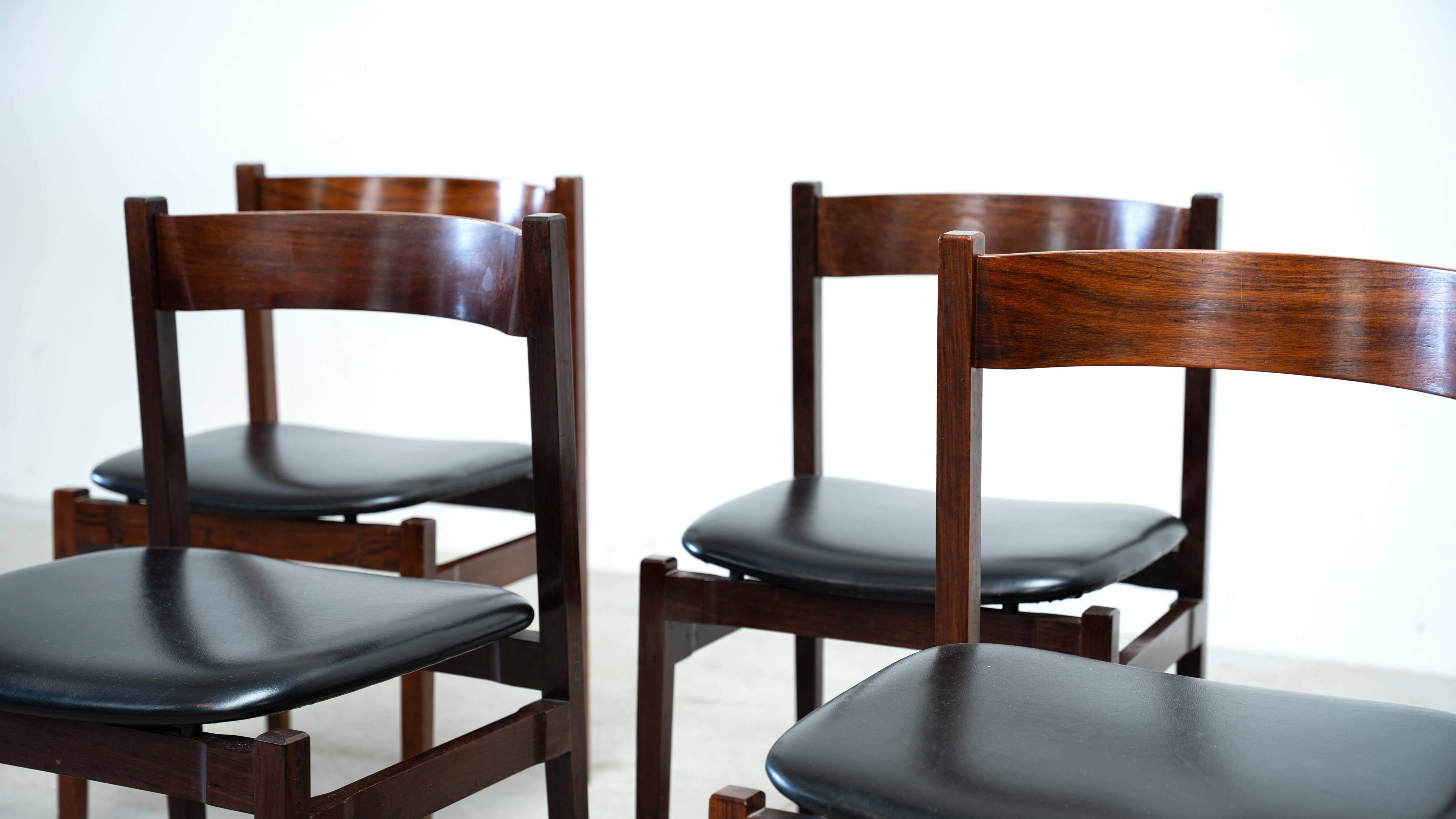 Set of six model 101 rosewood dining chairs by Gianfranco Frattini