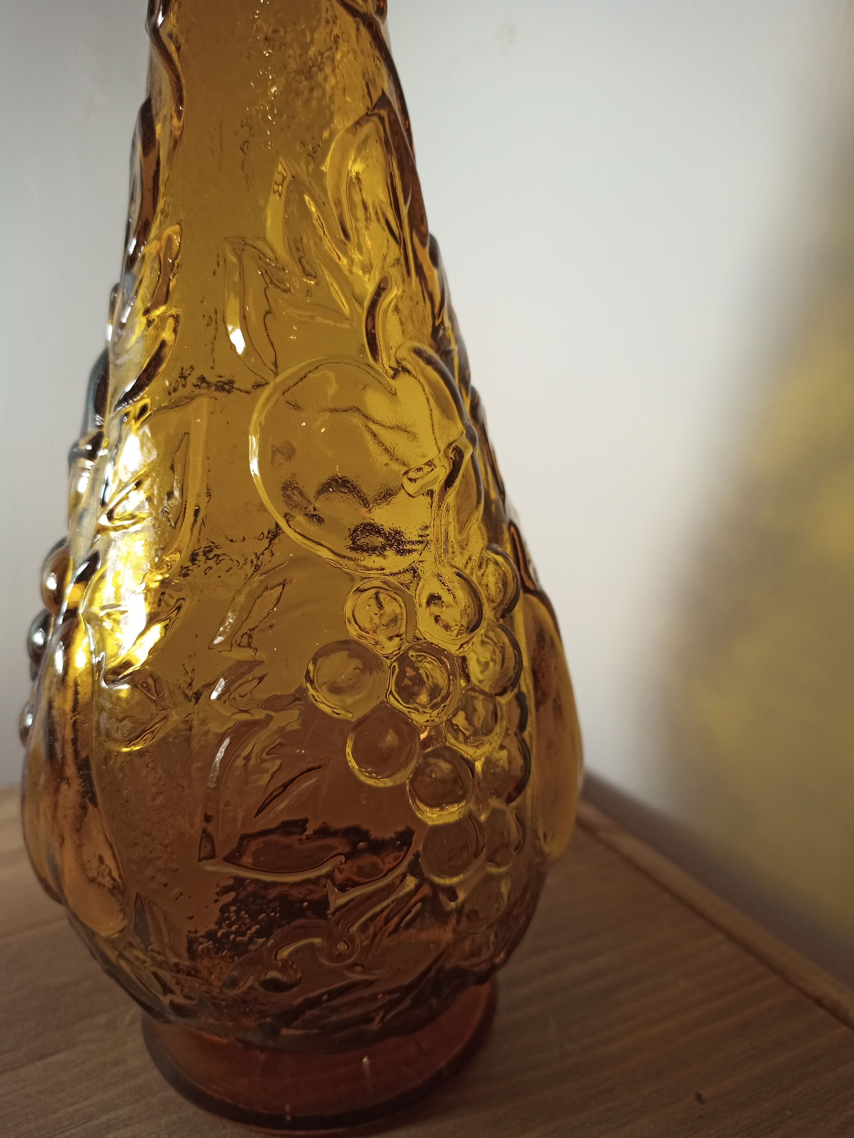 Moulded glass carafe with fruit motifs