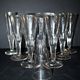 Portieux? Set of 10 cut glass champagne flutes from 1900 bistro.