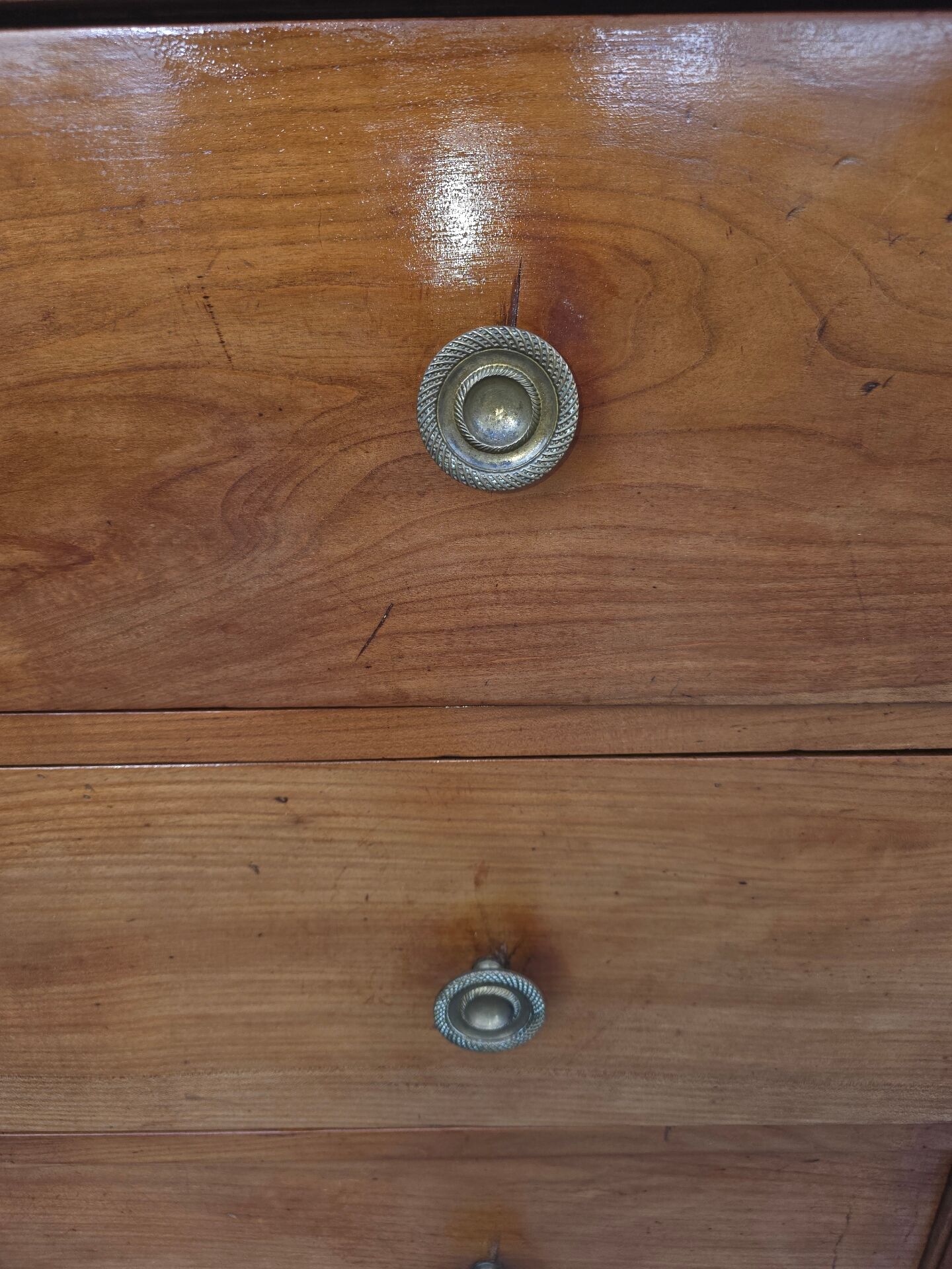Empire style chest of drawers in cherry wood