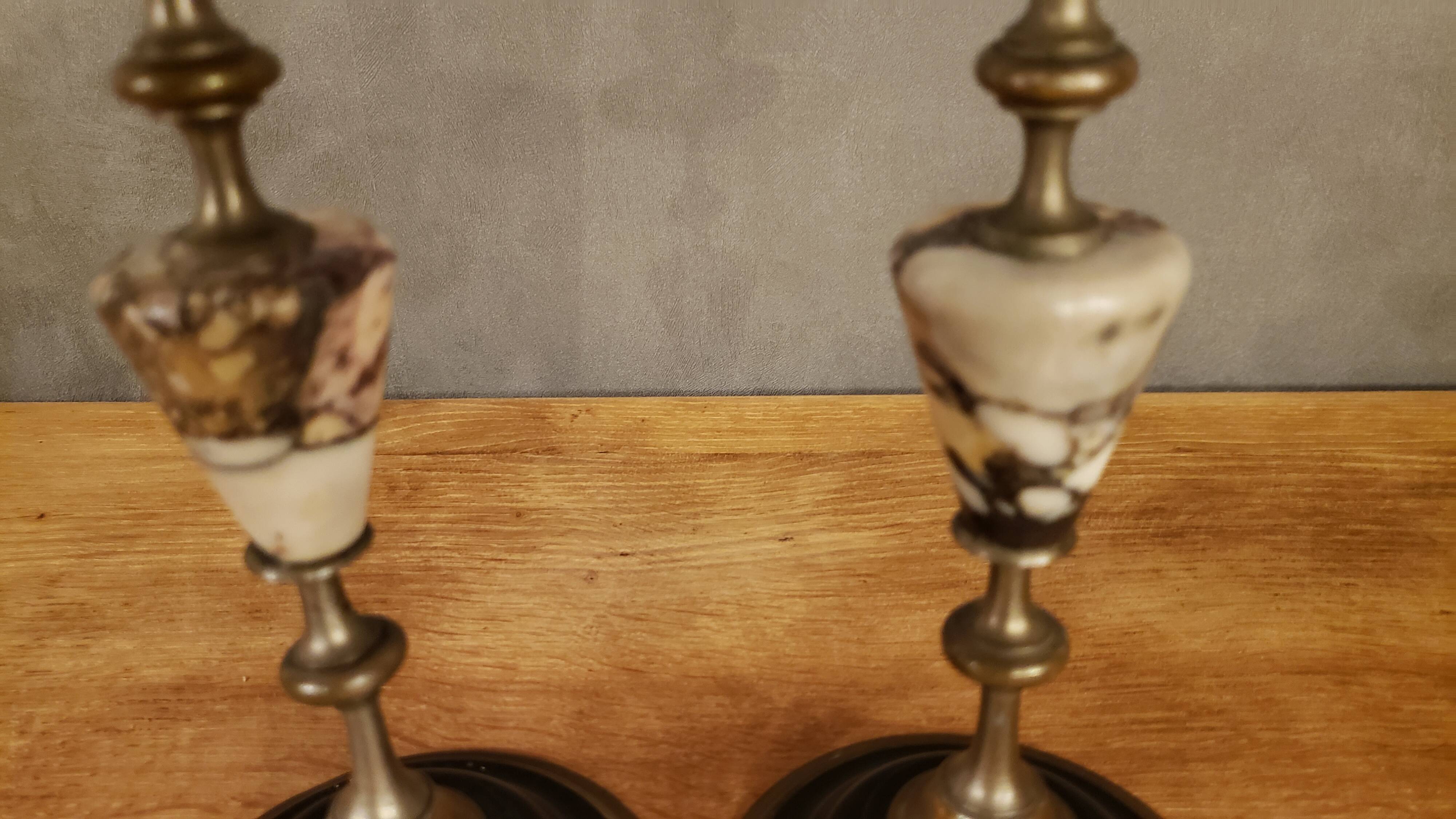 Pair of brass + marble or stone candlesticks