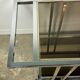 Belgo chrome serving cart/rolling table in chromed and gold-plated brass, 70s