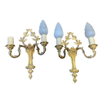 Pair of double sconces in gilded bronze