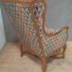 Bergere à oreilles en bois sculpté de style régence