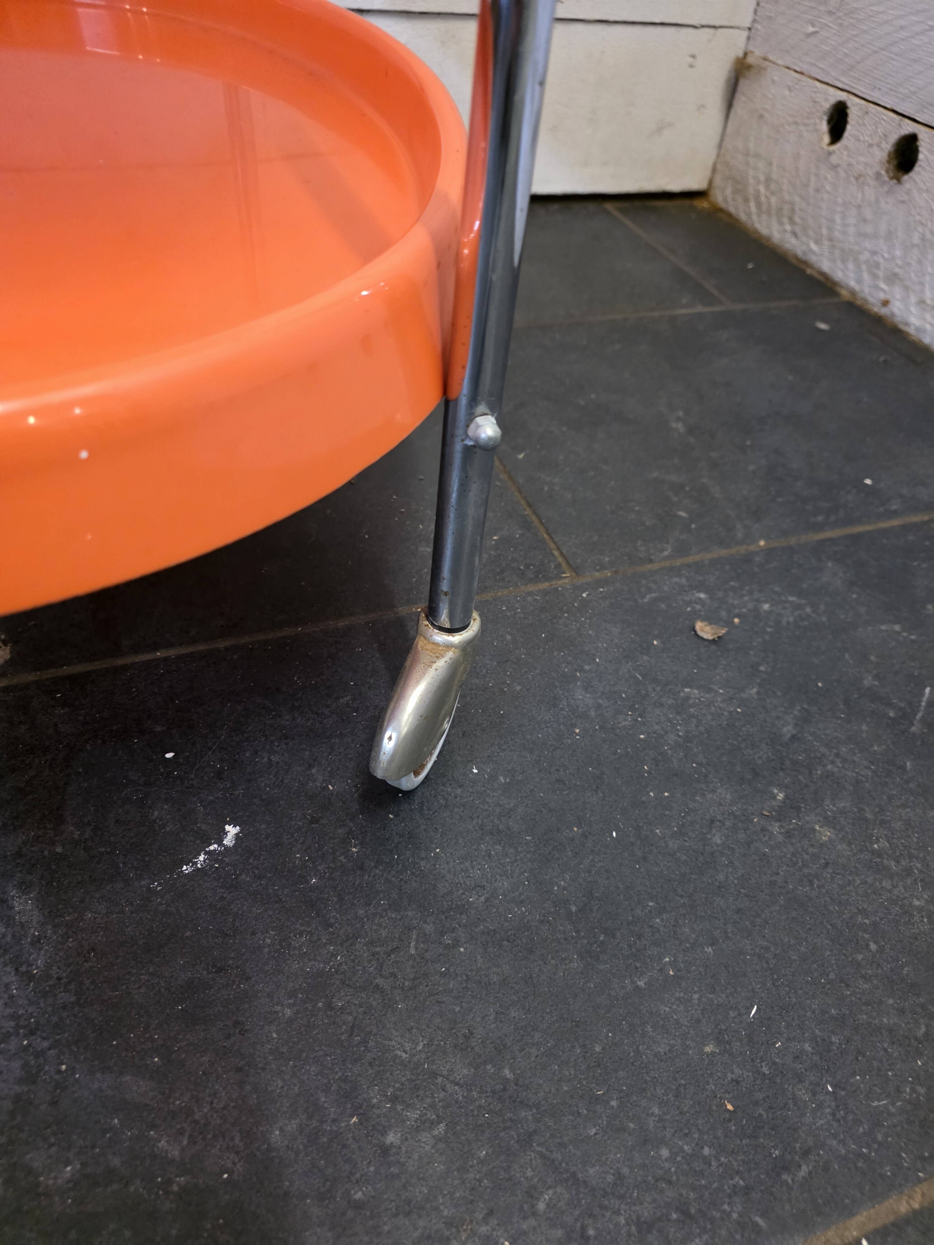 Orange rolling trolley from the 70s