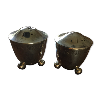 Salt and pepper set in silver metal