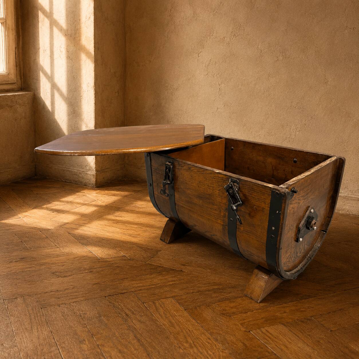 Oak barrel-shaped storage chest with black metal straps, 1930s-1940s.