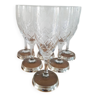 Crystal flutes with a silver rimmed foot