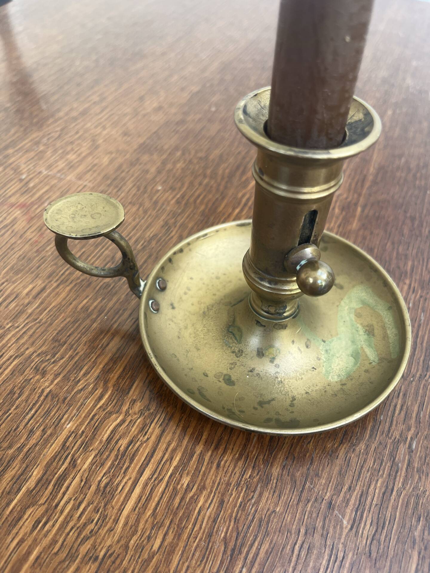 Antique push candle holder