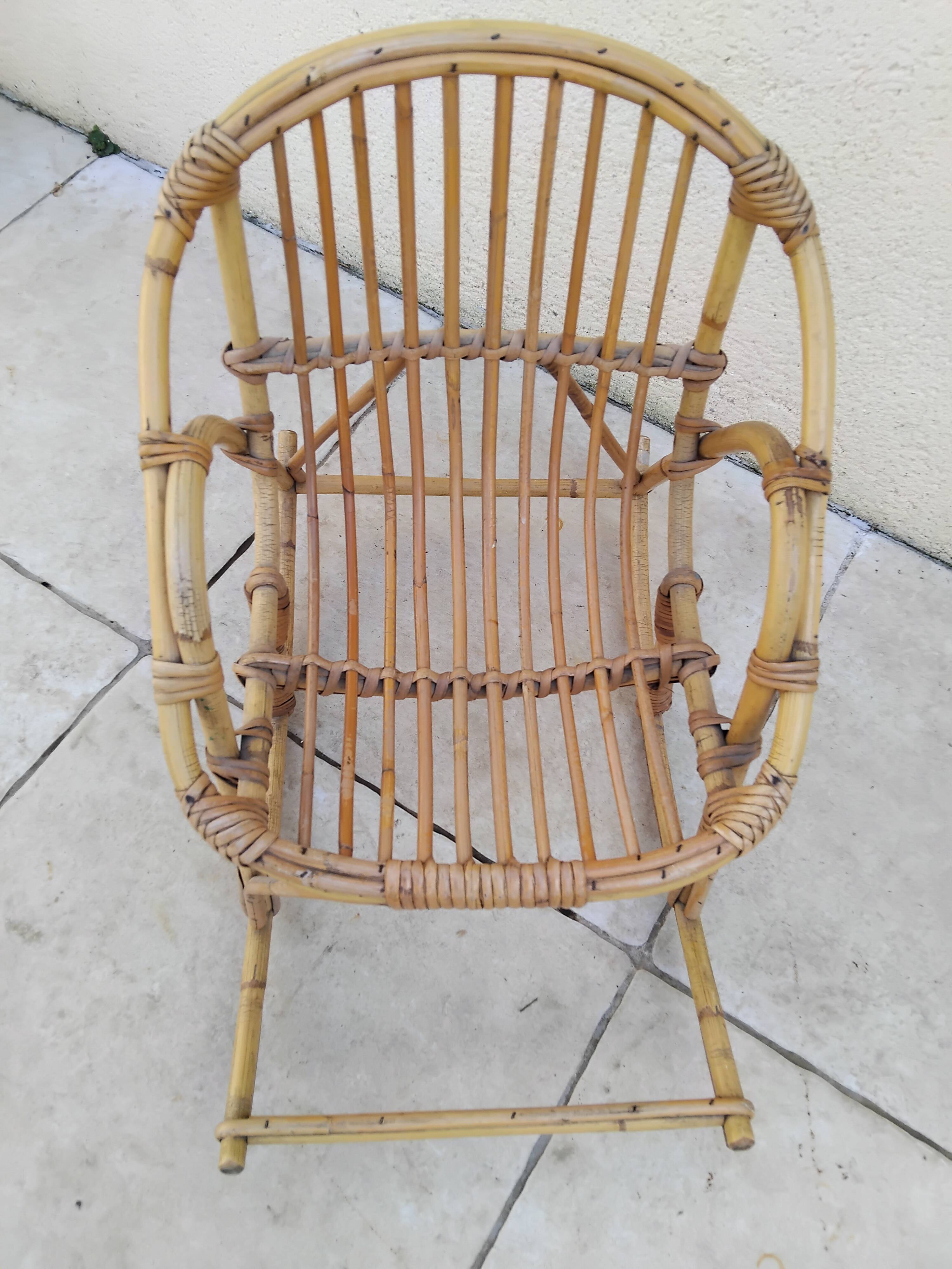 Vintage children's rattan rocking chair