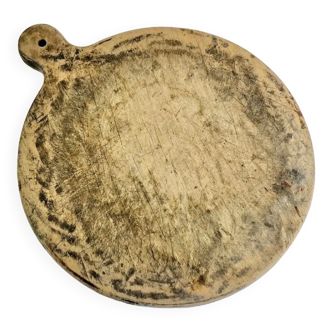 Old large round pizza cutting board