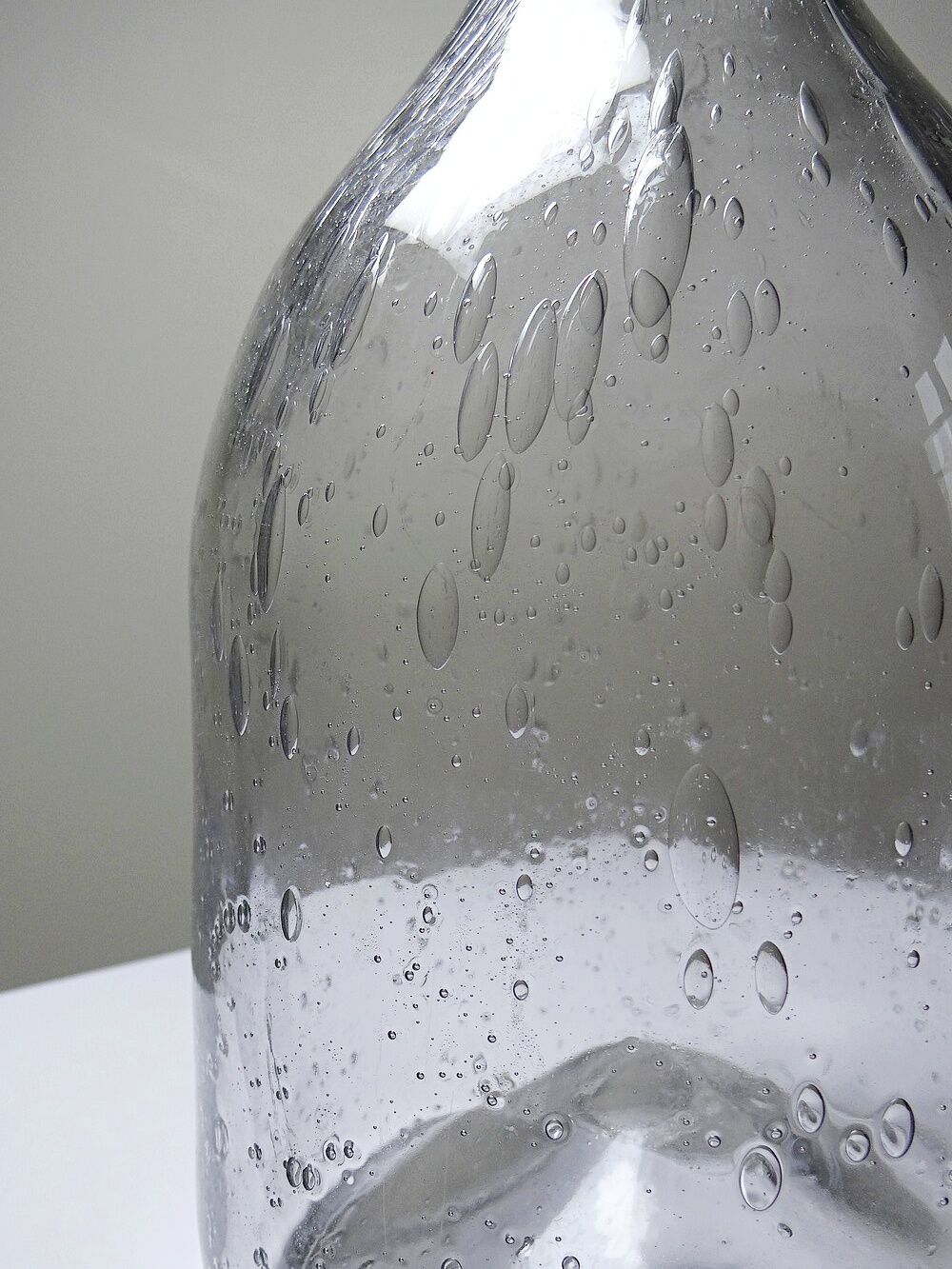 Large antique blown glass bottle with bubbles, early 20th century 1900-1920.