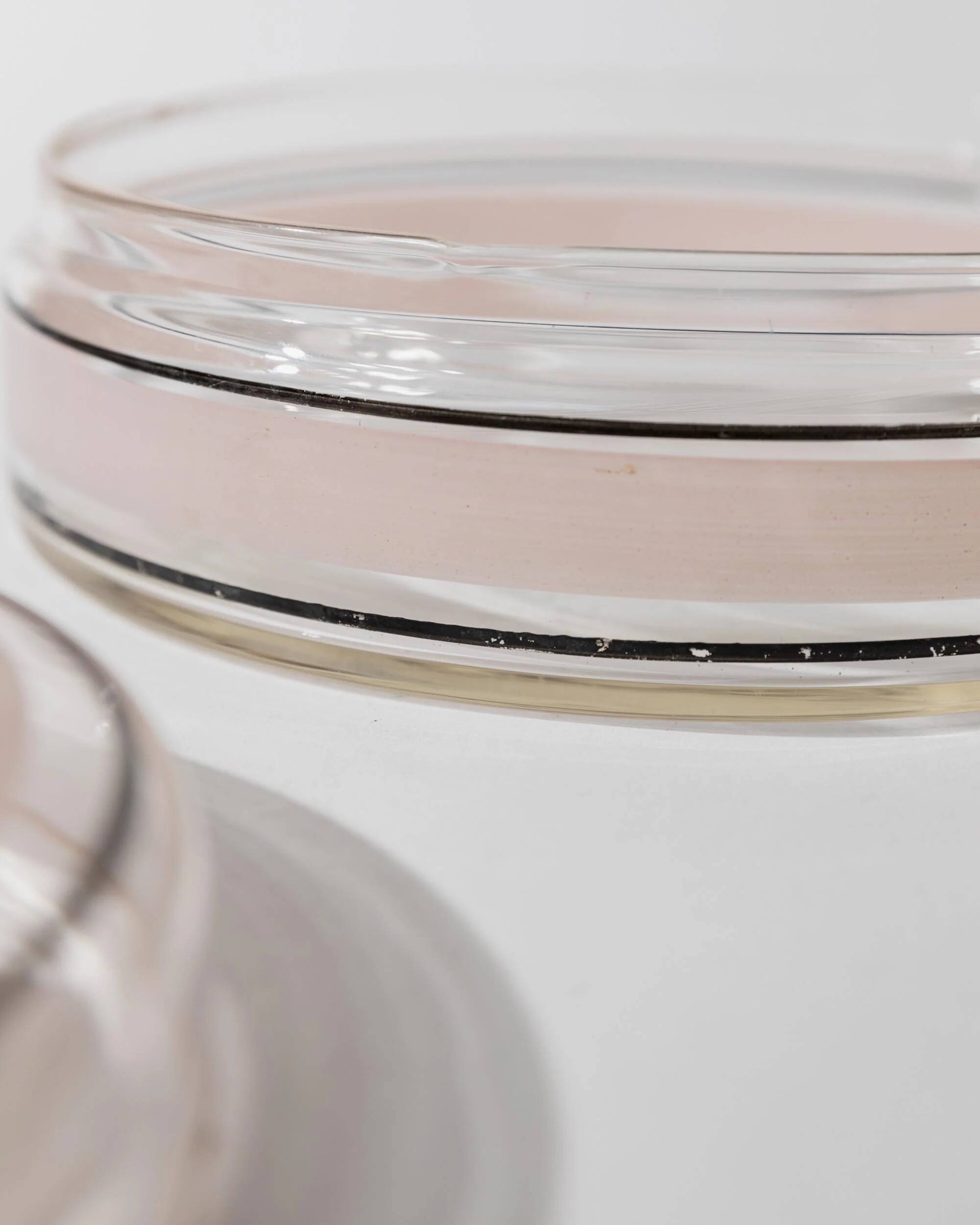 Vintage glass sweet jar from the 1960s, candy jar with a pink and black striped lid, Italian glass art.