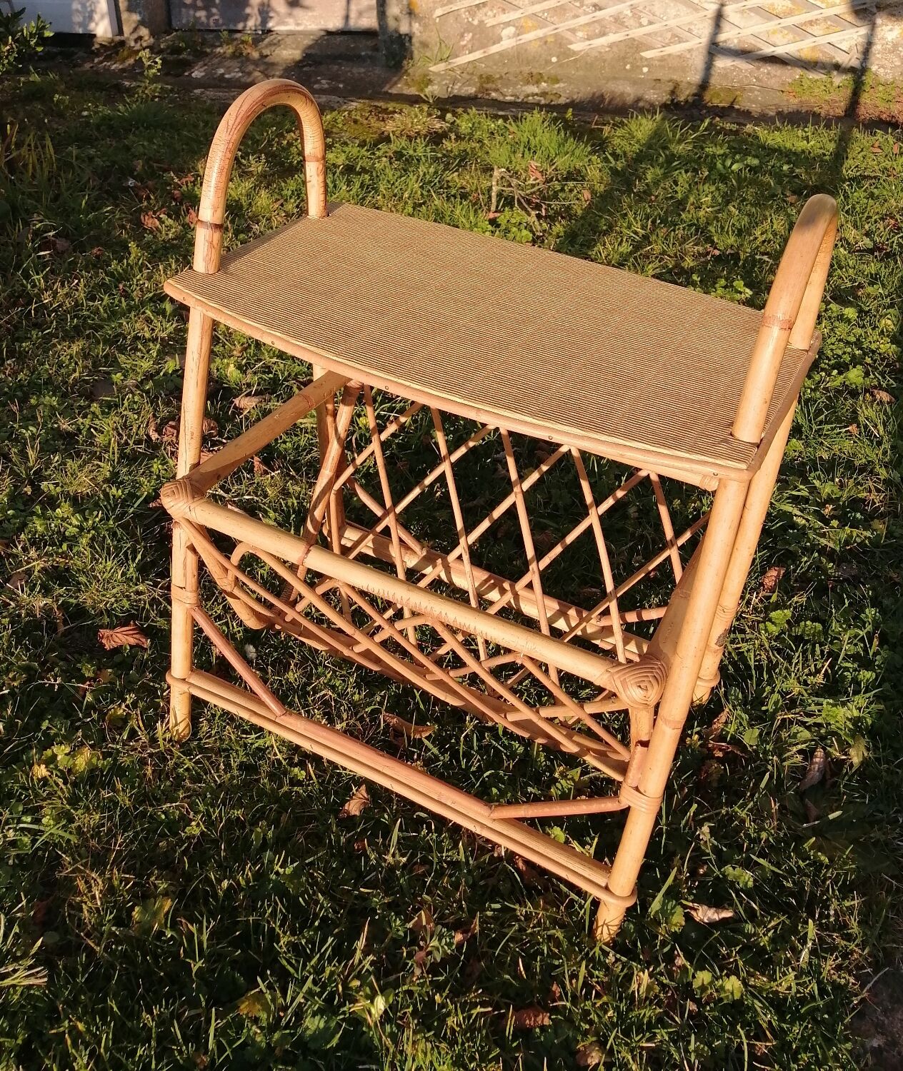 Rattan table at the end of the sofa