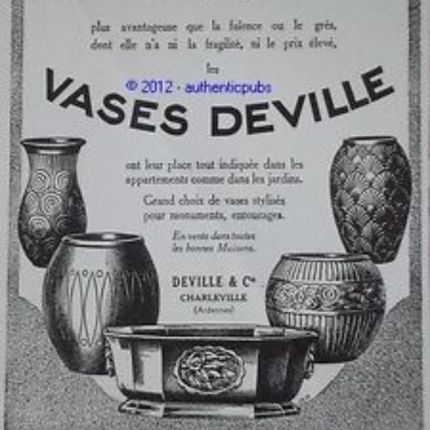 Pair of enamelled cast iron vases