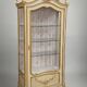 Louis XV / Rococo style display cabinet, painted wood in cream and gold tones.