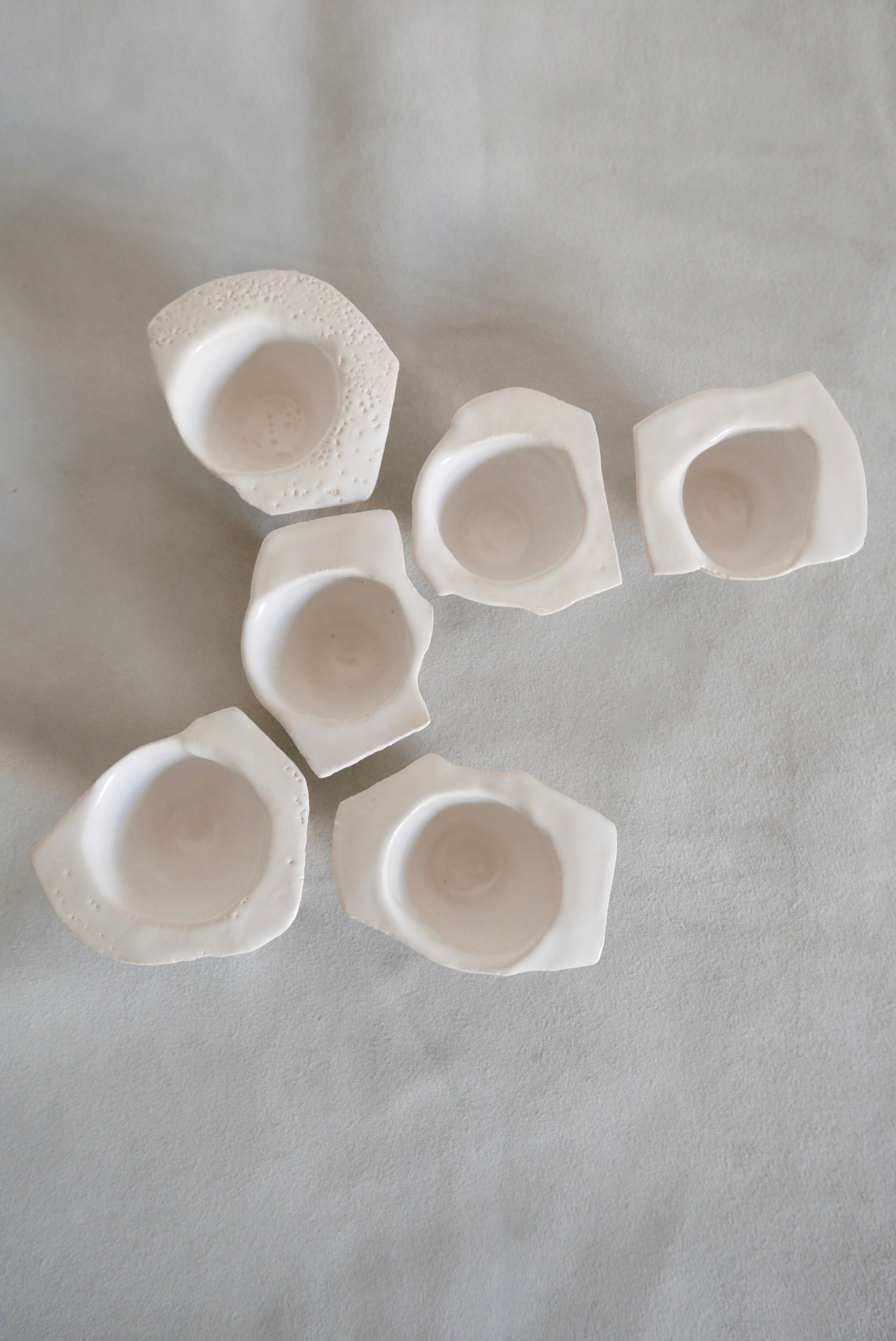 Six white stoneware sake glasses Denise Bresciani ceramics