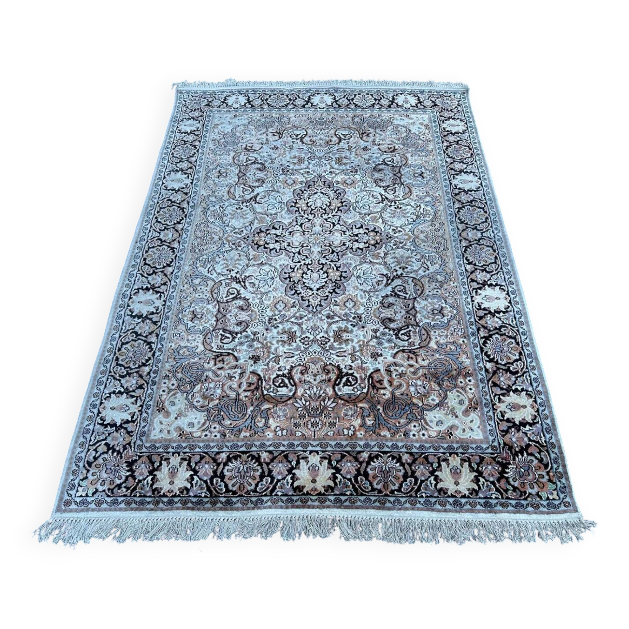 Hand-knotted Persian silk rug
