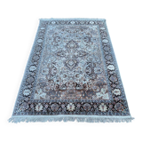 Hand-knotted Persian silk rug