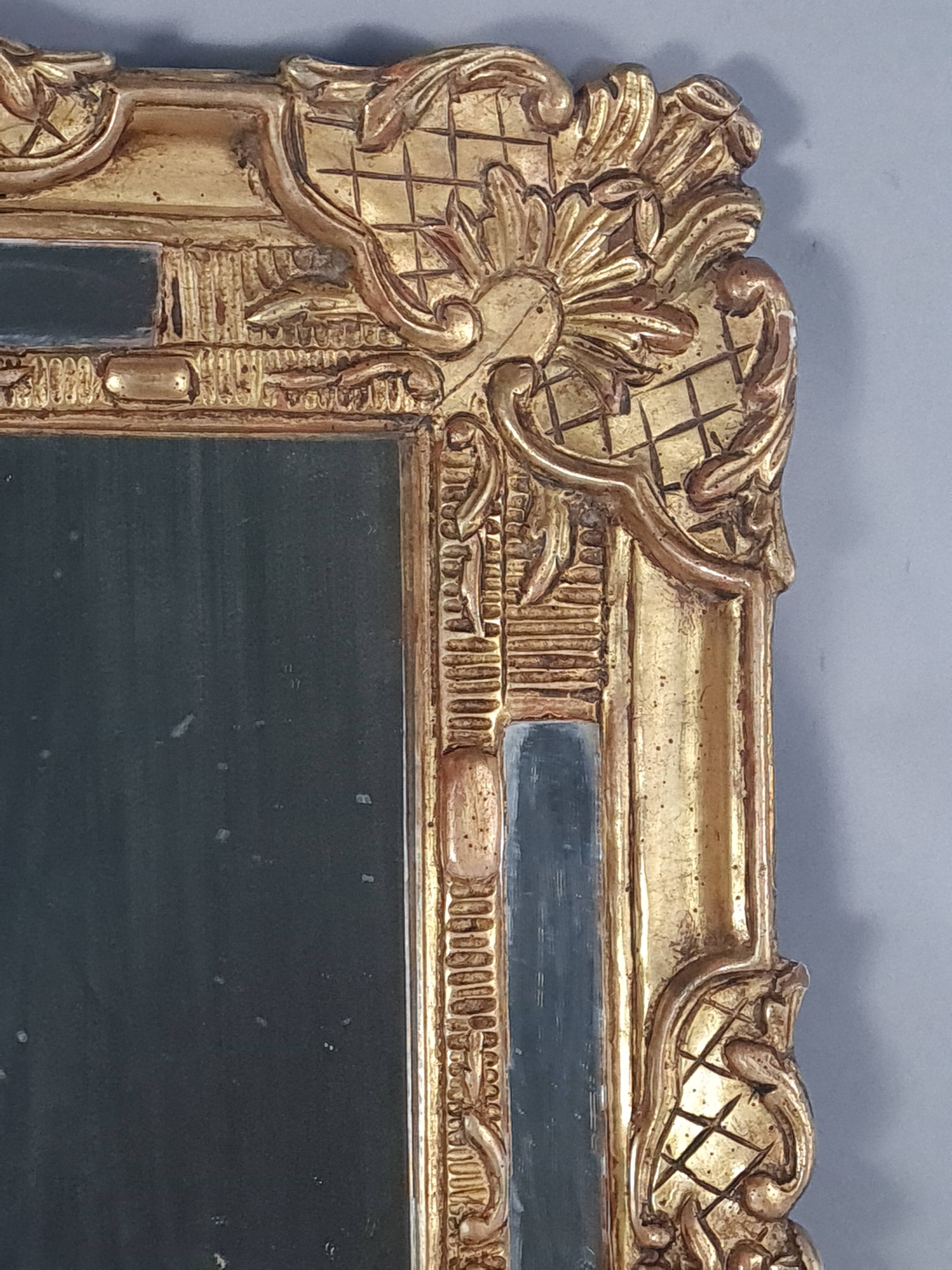 Antique mirror with carved wood frame and original gilding, 69x53 cm, C820.