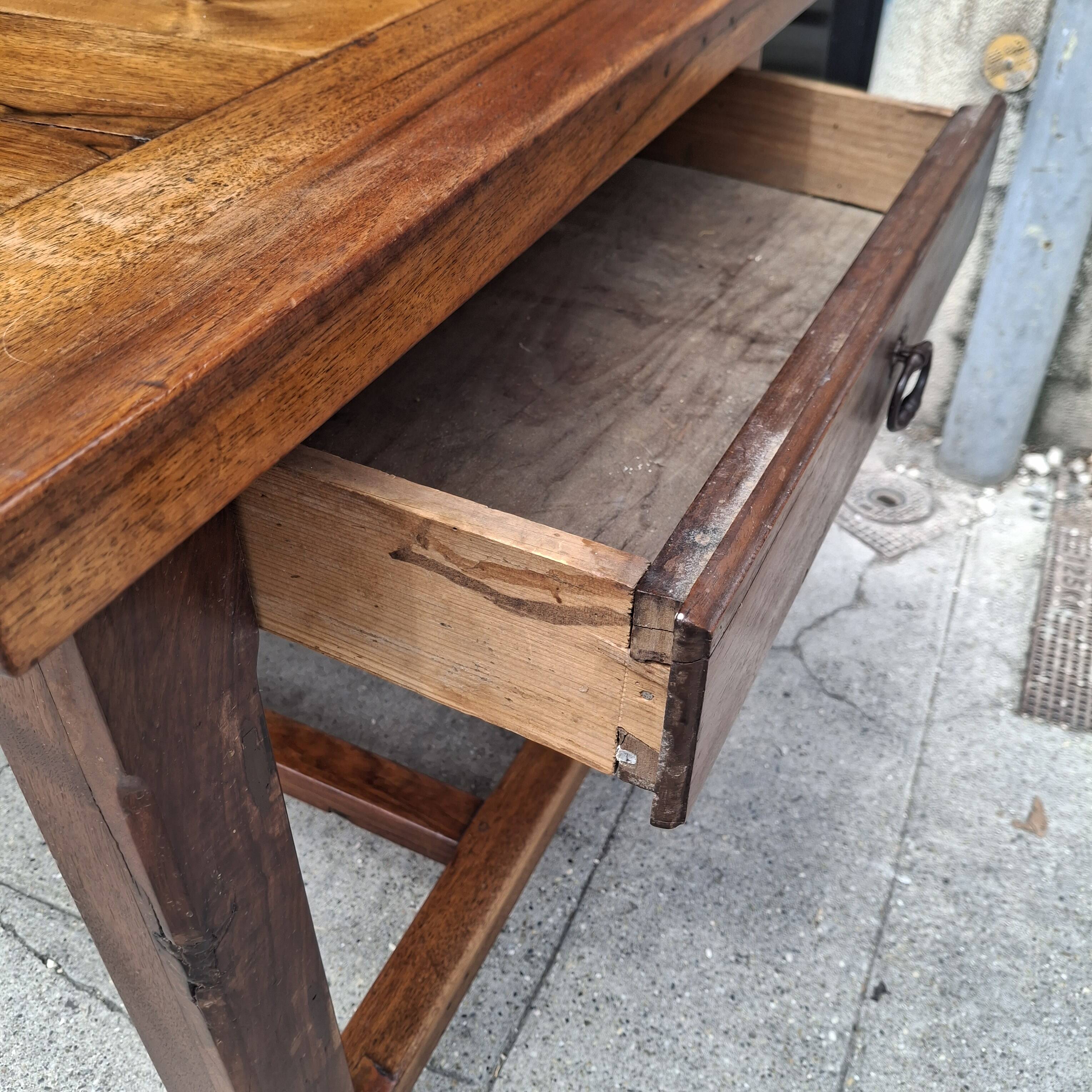 Large farmhouse table in walnut.