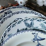 Set of four flat plates in iron earth