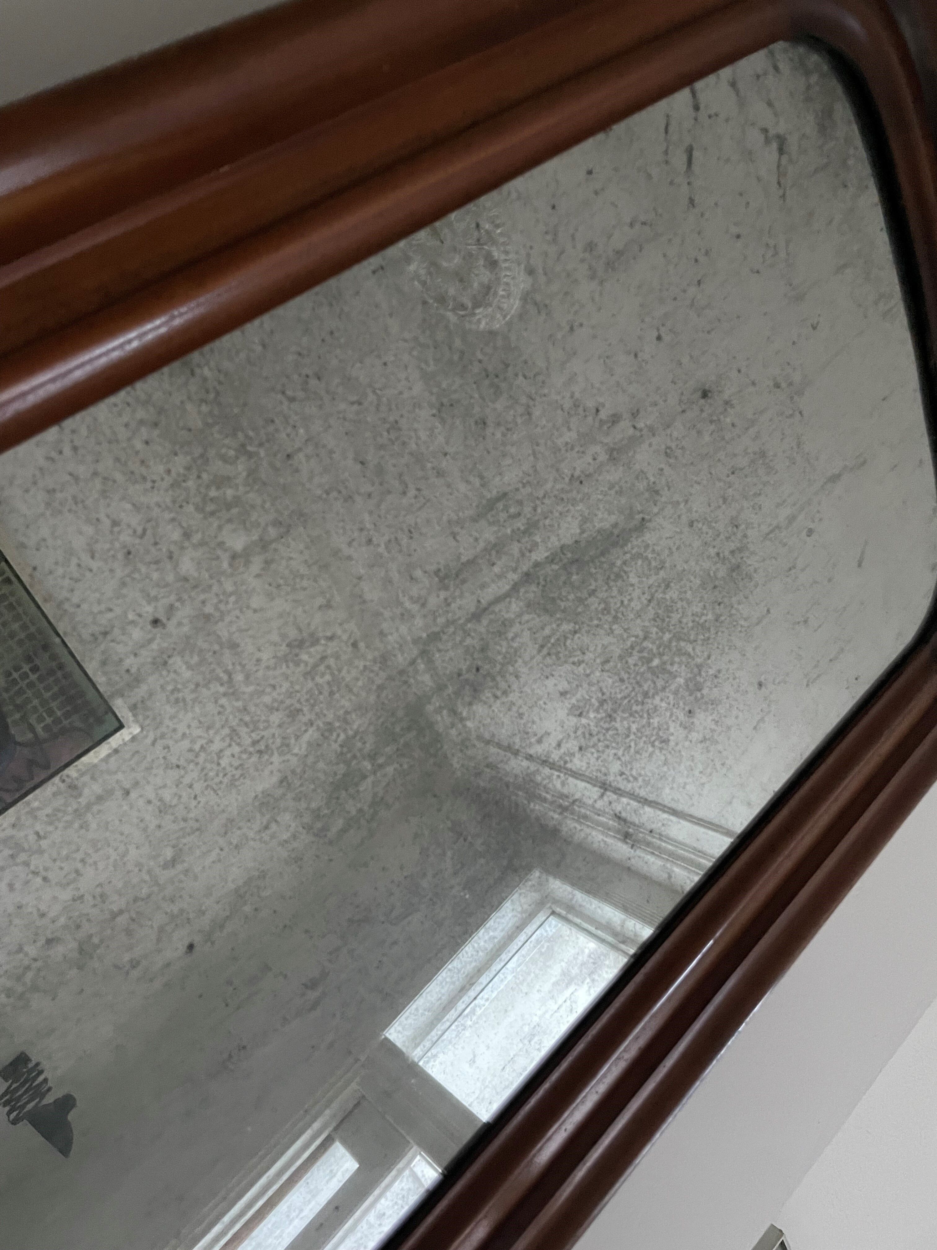 Antique mirror with mahogany frame and silver patinated mirror