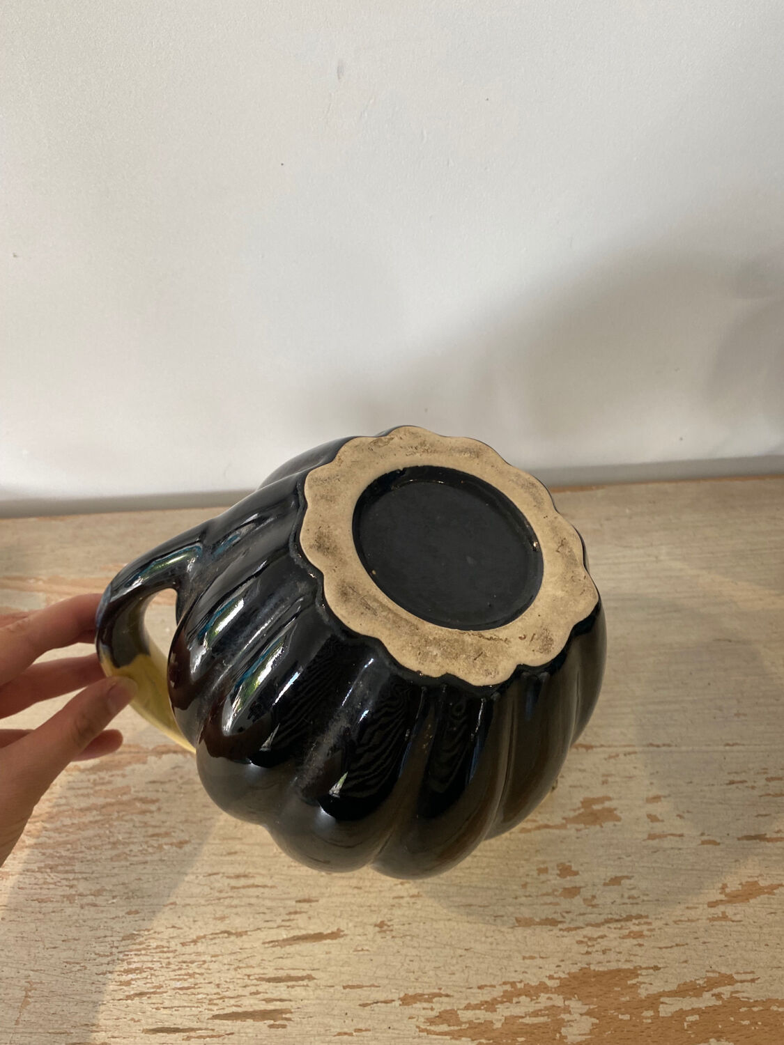 Bowler pitcher handle deported