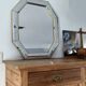 Octagonal mirror with brass parcloses by Jan Deknudt
