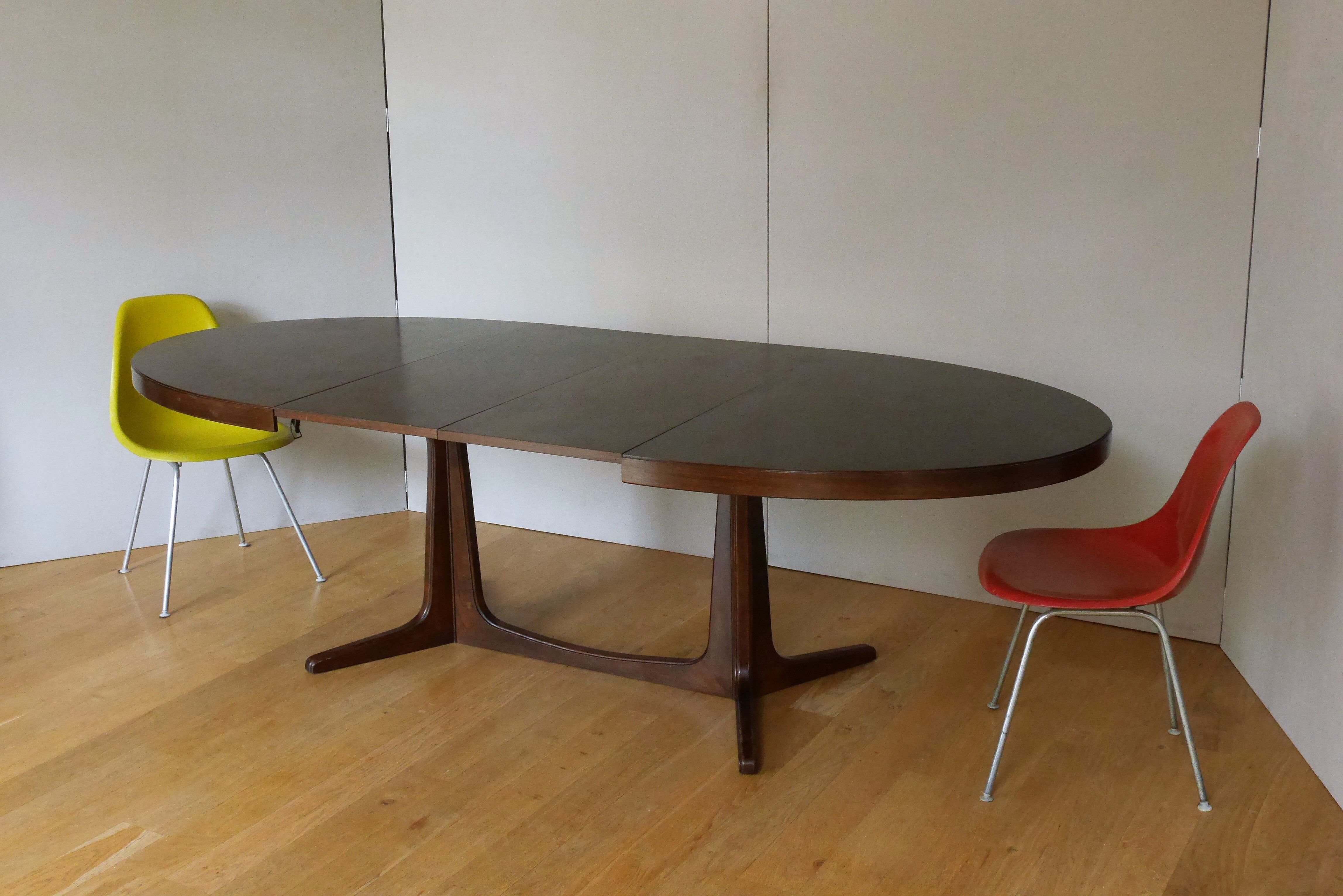 Extendable oval elm table with Baumann extensions