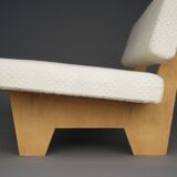 Canapé compact de style néerlandais avec base en bois. Années 1960.