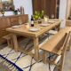 Solid oak extendable farmhouse table with 2 drawers.