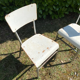 Pair of chairs in patinated white wood and metal structure