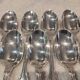 12 silver plated dessert spoons, goldsmith Ravinet Denfert shell