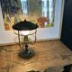 Antique patinated green metal lamp, Art Nouveau style, early 20th century.
