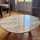 Organic coffee table in travertine.