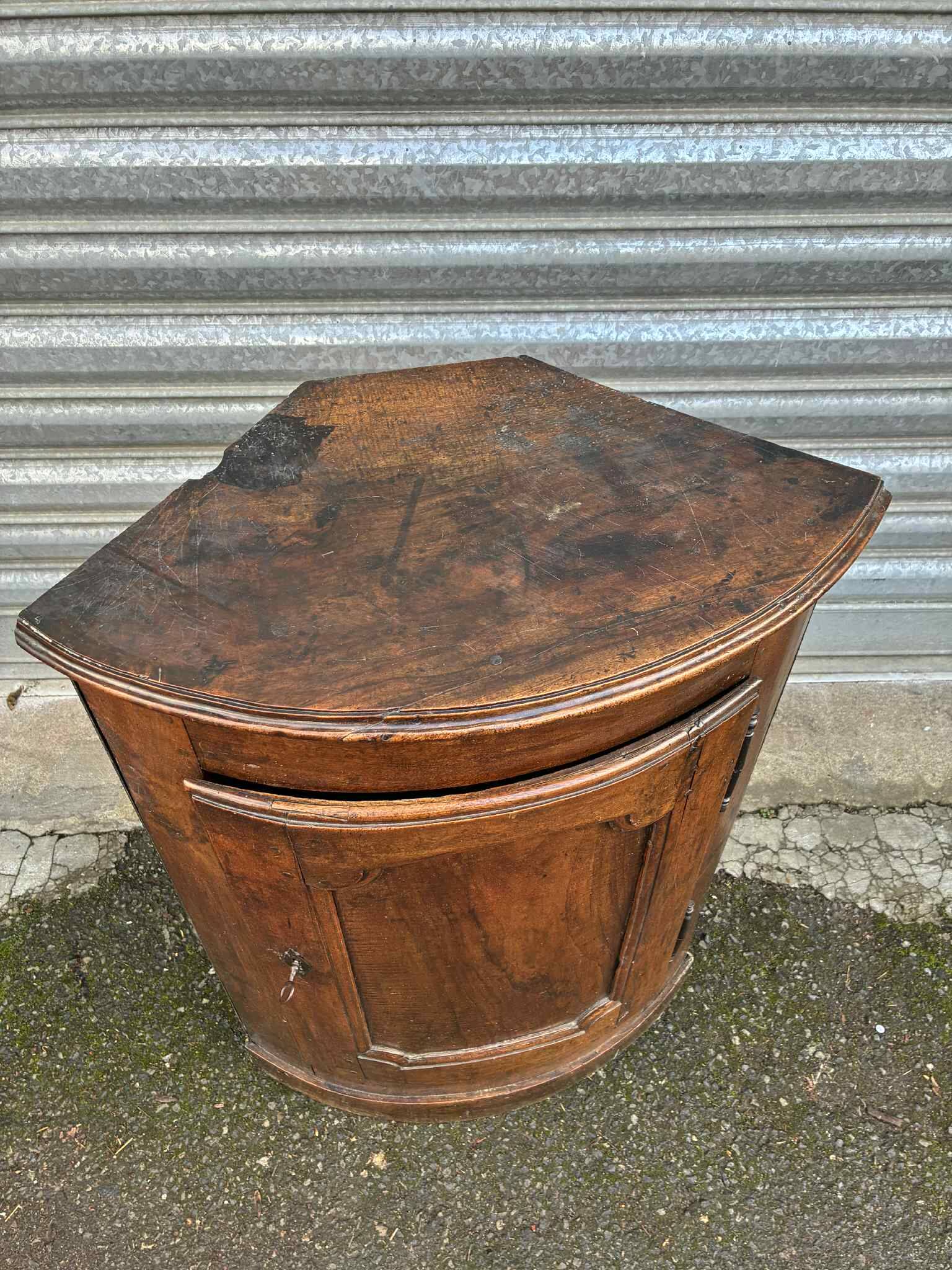 Small wooden corner accent table.