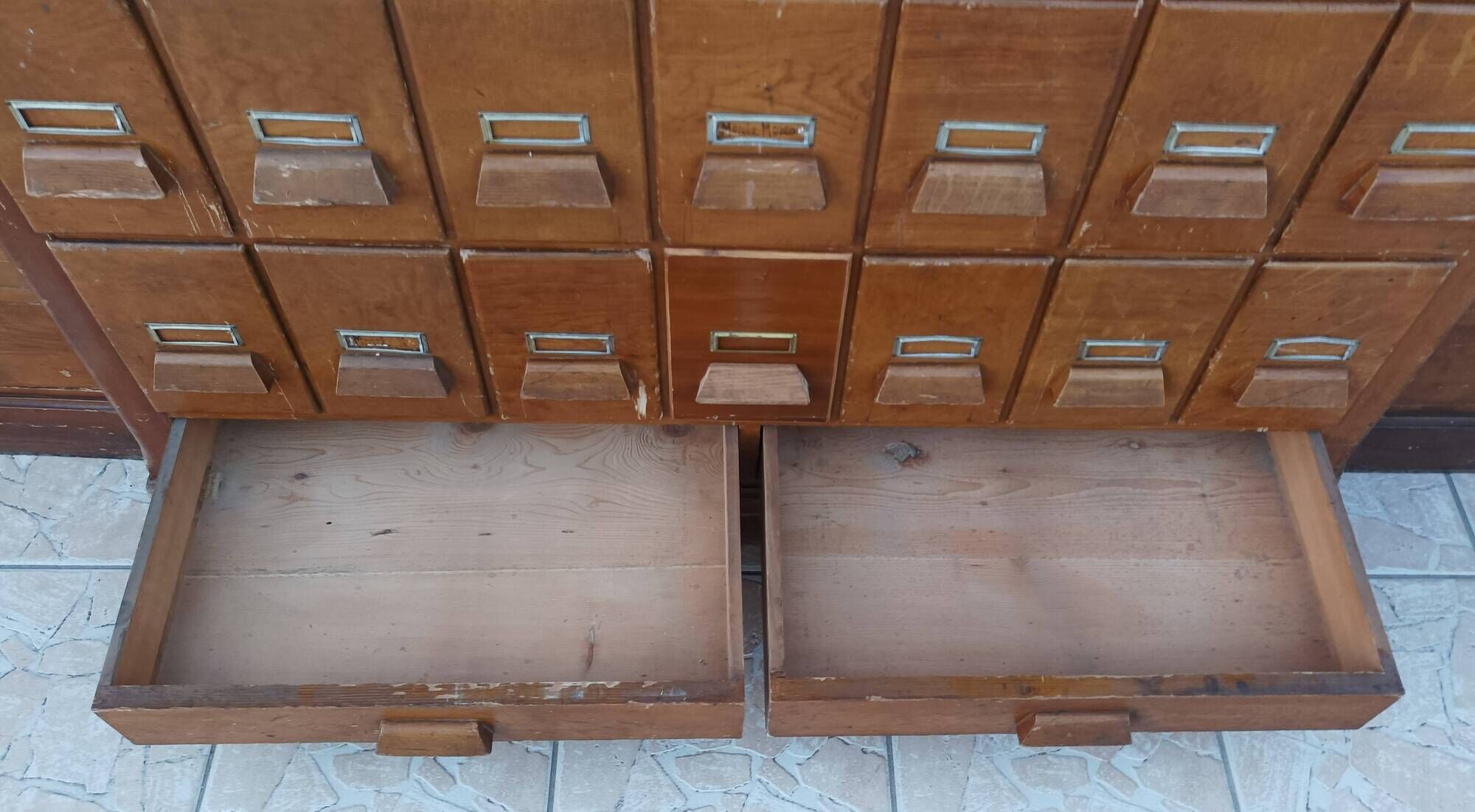 Apothecary or trade cabinet in fir with 53 drawers.