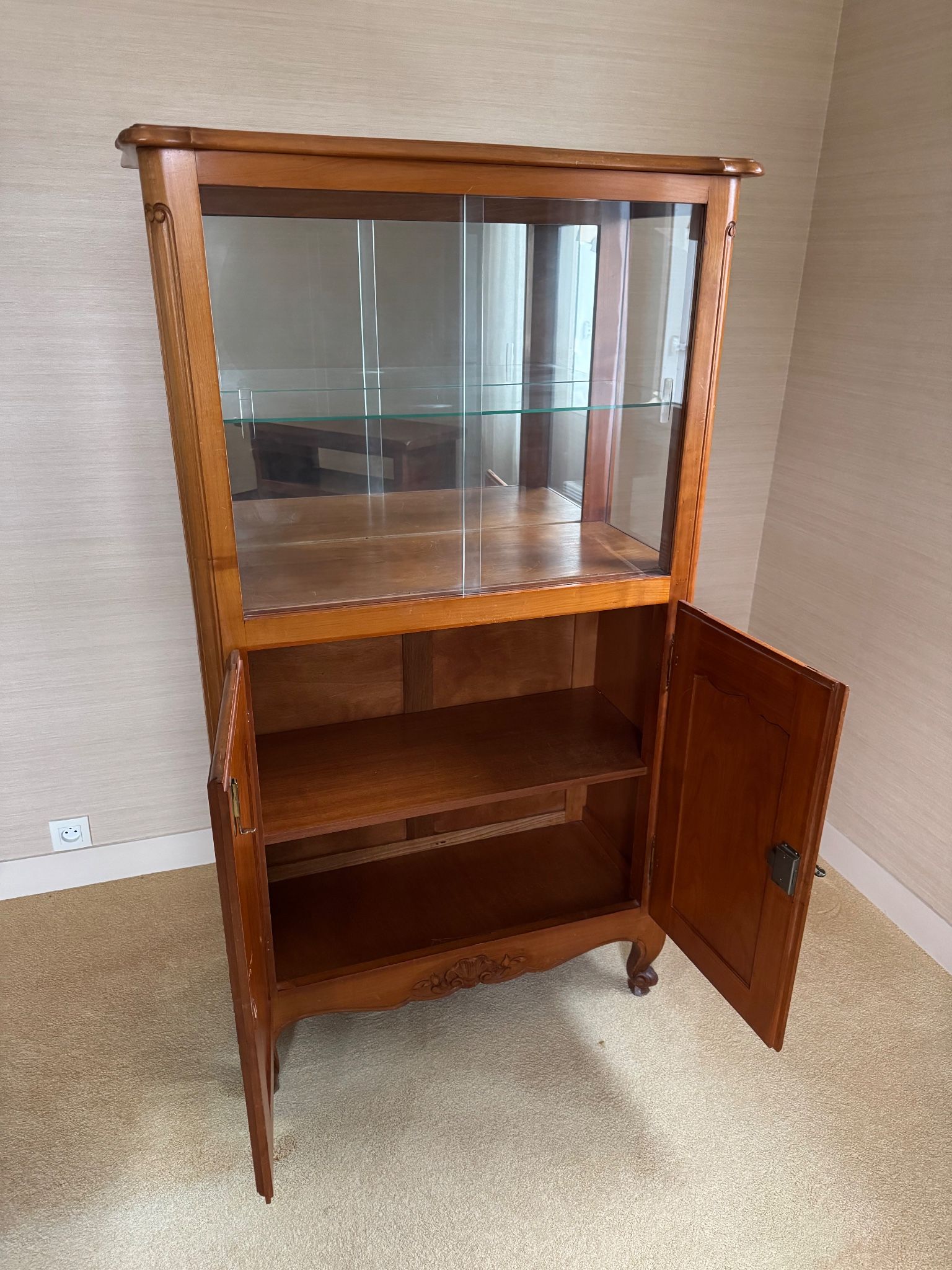 Louis XV style display cabinet, glass doors and chevron panels.