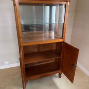 Louis XV style display cabinet, glass doors and chevron panels.