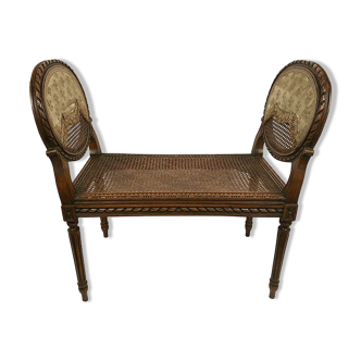 Small bench in natural wood with a Louis XVI style cane bottom