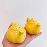 Salt and pepper shakers in the shape of a teapot.
