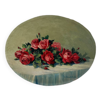 Old oil painting on oval wood with roses thrown from the 30s