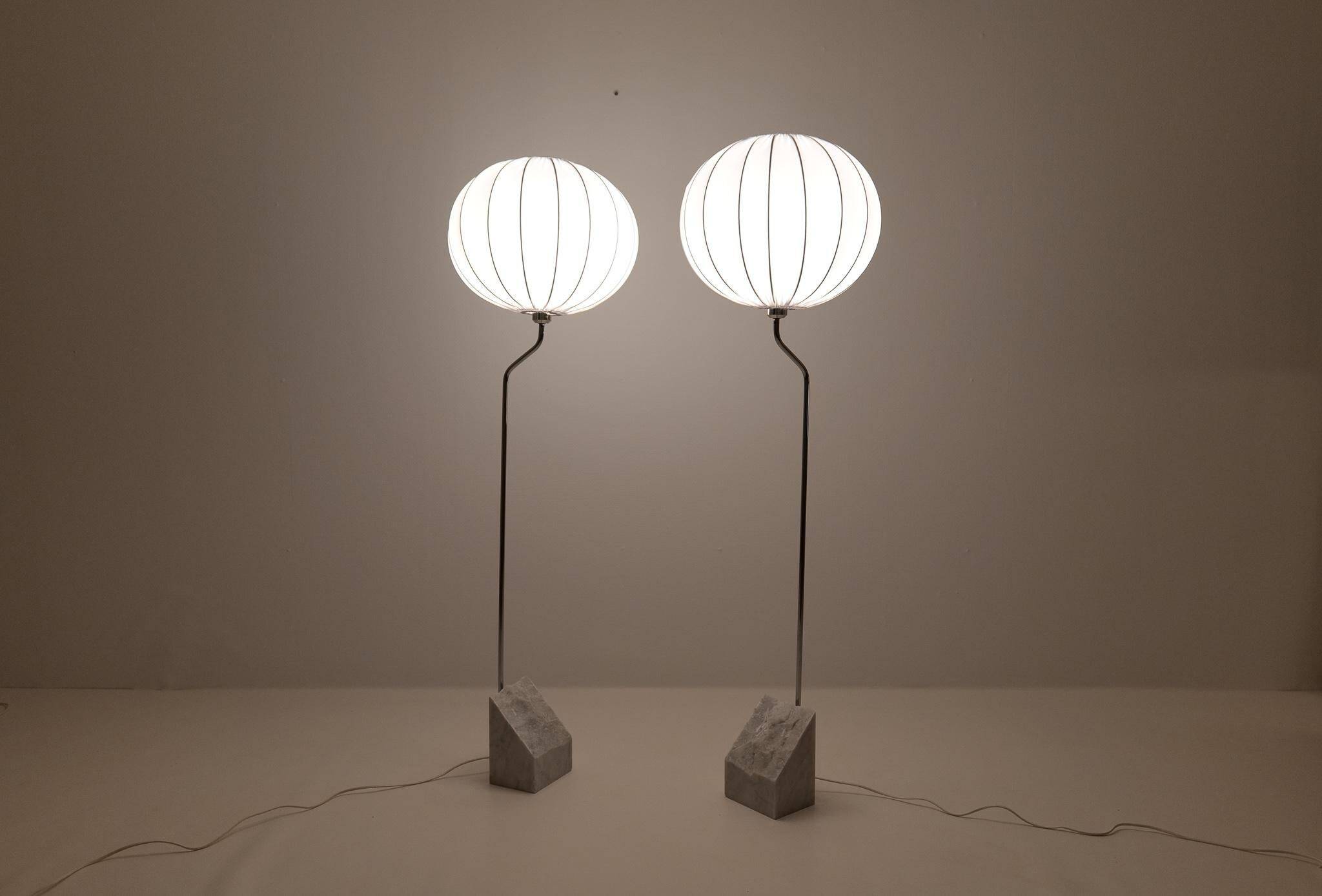 Pair of Bergboms marble and steel floor lamps from the mid-century, 1970s, Sweden.