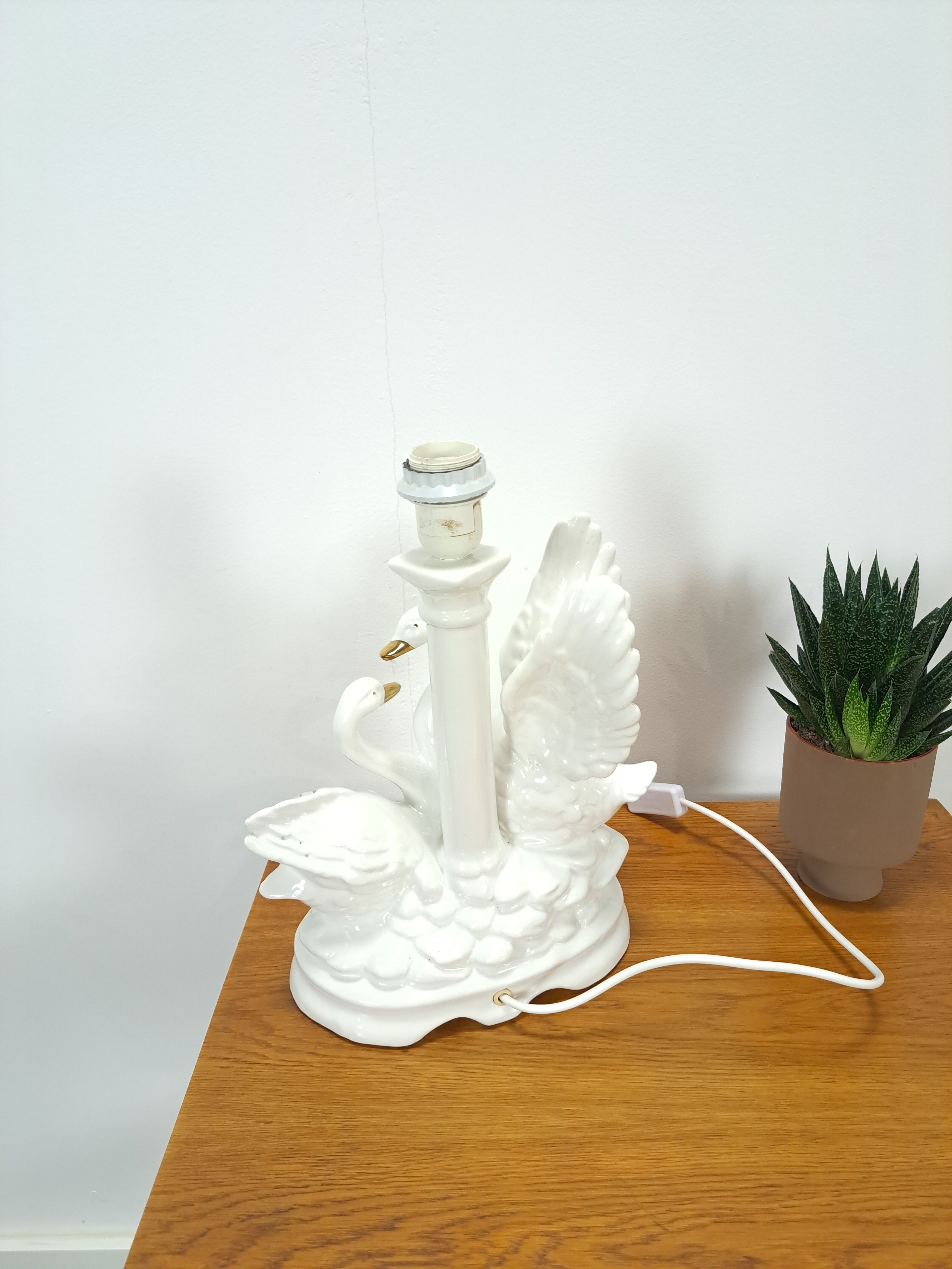 Porcelain lamp swans with vintage gold details