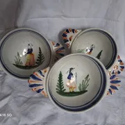 Set of three antique earthenware bowls from HB Quimper, signed.