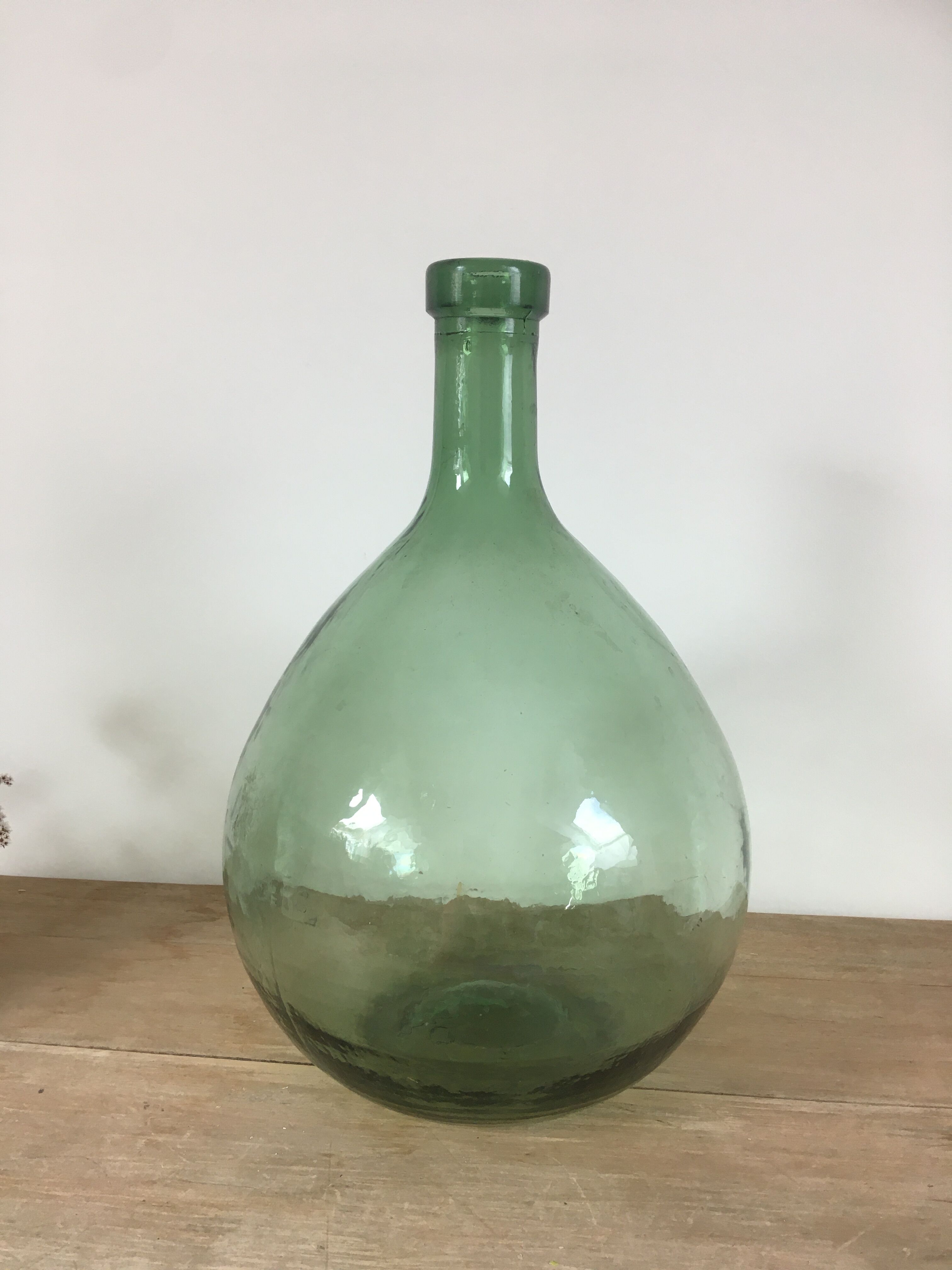 Vintage green demijohn
